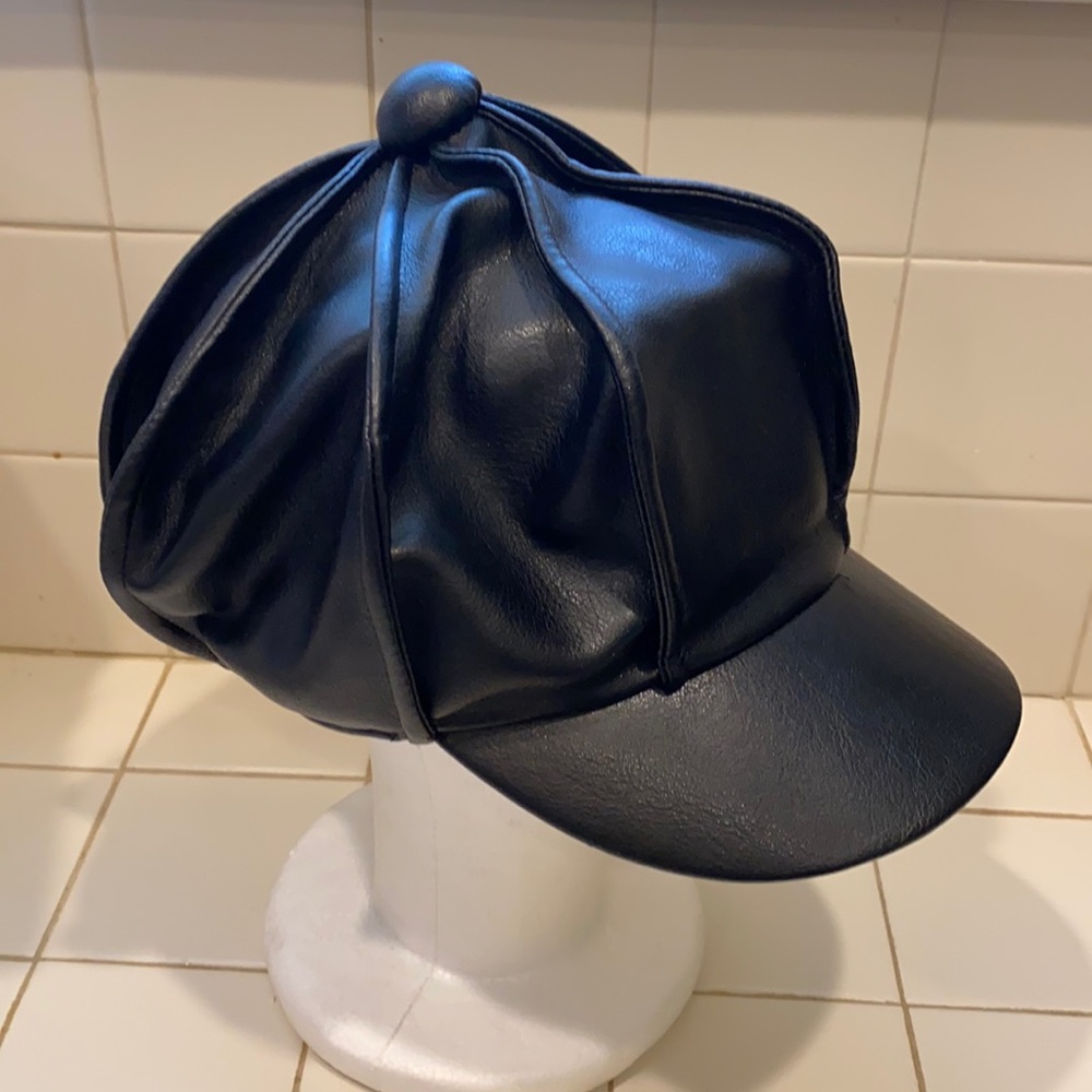 Black Elope newsboy style hat polyester in great condition